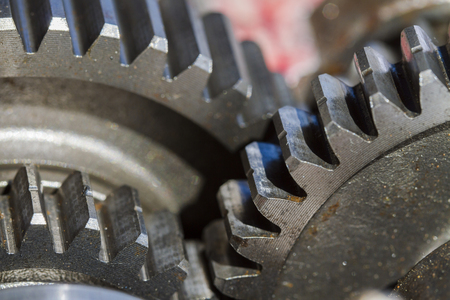 engine gear wheels, industrial background.