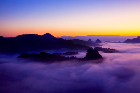Mountain view with foggy environment during sunrise in the morning in baan jabo view point Pang Mapha Mae Hong Son Province of Thailandの写真素材