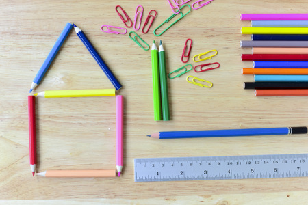 Back to school. Colorful Office and study art stationery objects on wood table with open notebook.Kid love to drowing.の写真素材