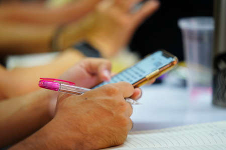 Happy small toy doll mockup full shopping bag in cart. Shopping addiction lover or shopaholic concept.の写真素材