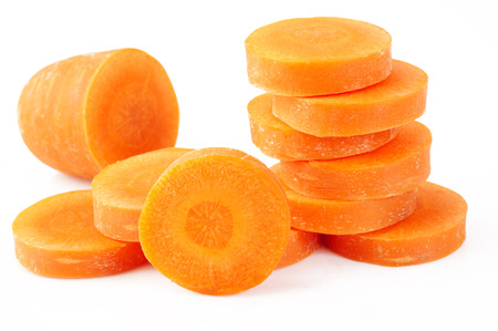 slice carrot on white の写真素材