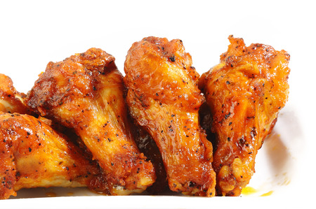 Chicken wings spicy on white backgroundの写真素材