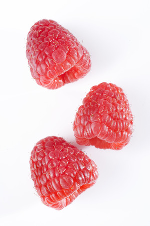 Raspberry fruit on white background