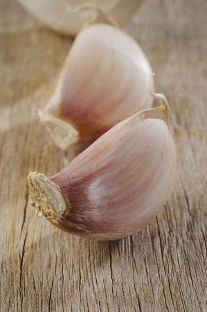 Garlic spice on wooden backgroundの写真素材