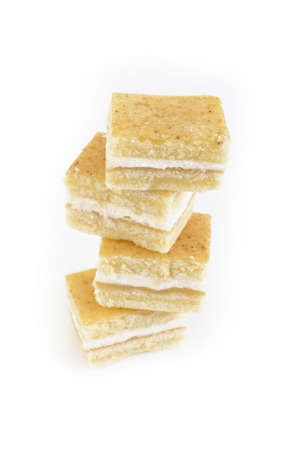 Jam roll cake on white backgroundの写真素材
