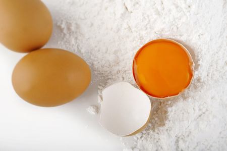 crack egg on flourの写真素材