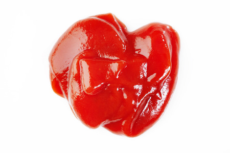 Tomato ketchup on white backgroundの写真素材