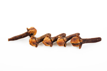 Cloves herb on white background