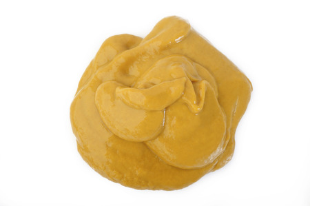 Mustard sauce isolated on white backgroundの写真素材