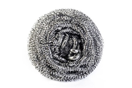 stainless steel scourer on white backgroundの写真素材