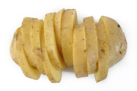 Fresh sliced potatoes on white backgroundの写真素材