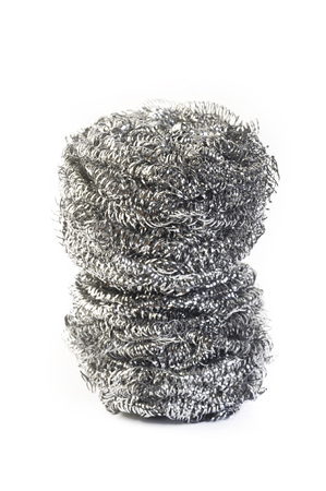stainless steel scourer on white backgroundの写真素材
