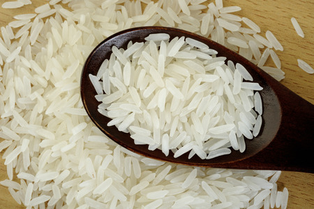 rice in wooden spoonの写真素材
