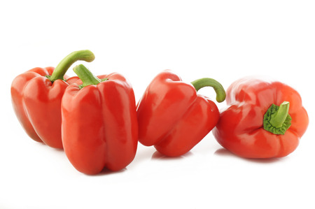 ripe red pepper isolated on white backgroundの写真素材