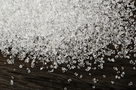 sugar on wooden table backgroundの写真素材