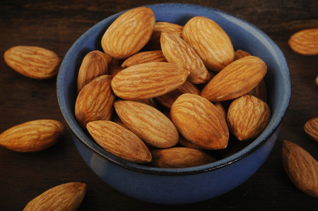 almond nuts in bowlの写真素材