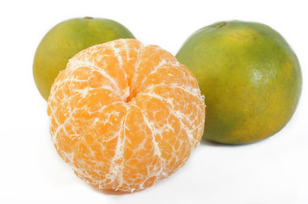 orange mandarin or tangerine fruit on white backgroundの写真素材
