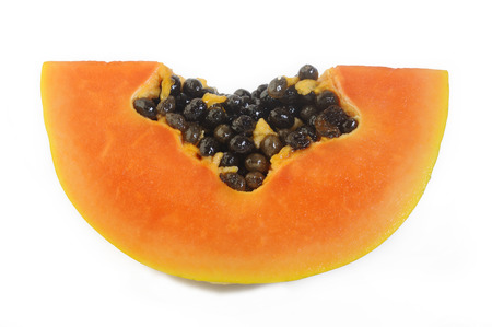 sliced papaya on white backgroundの写真素材