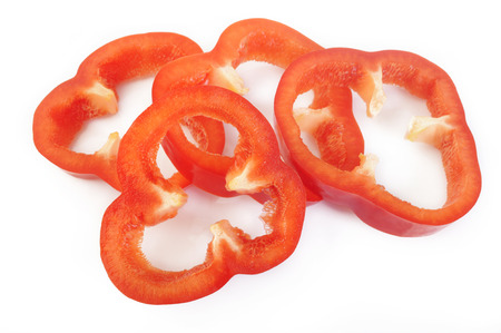 Sliced red pepper isolated on white backgroundの写真素材