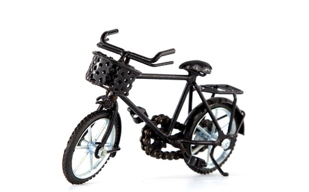 A toy bicycle is isolated on a white backgroundの写真素材
