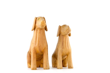 wooden dog isolated on white backgroundの写真素材