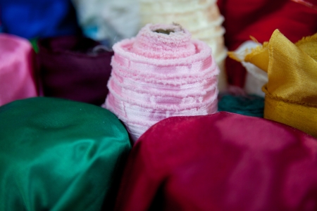 rolls of multicoloured textiles. Shallow depth of field.の写真素材