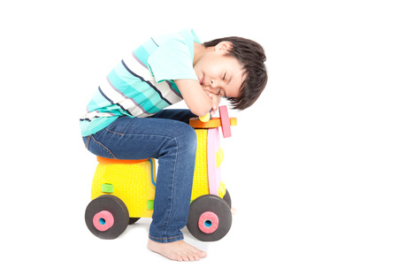 Young boy with bicycle  isolated on white backgroundの写真素材