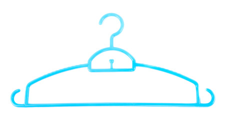 Coloured plastic hangers on a white backgroundの写真素材