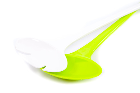 plastic ladle isolated on white.の写真素材