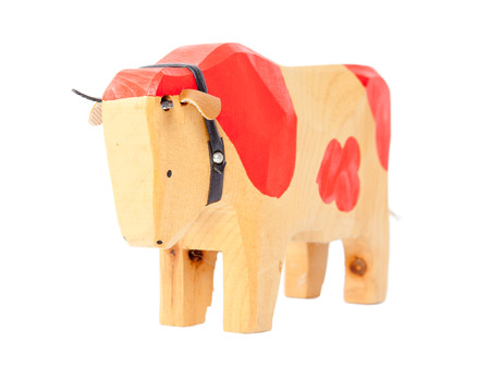 wood cow toy  isolated on white backgroundの写真素材