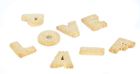 LOVE alphabet chocolate cookies isolated on white backgroundの写真素材
