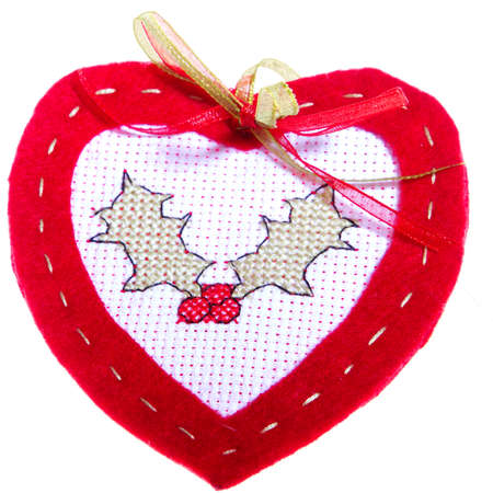 Red Heart Isolated on white with embroidered berry twigの写真素材