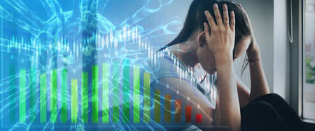 Woman mental health illness sitting sad headache stress business stock market economic downturn,...