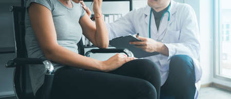 Sick woman mental health problem, fear virus outbreak epidemic. Psychologist doctor consulting female patient check record history of symptoms document in clinic office. Banner healthcare concept.の写真素材