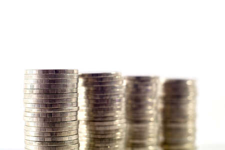 Close-up coins stacks thai baht on white background. business and saving concept (Selective Focus)の写真素材