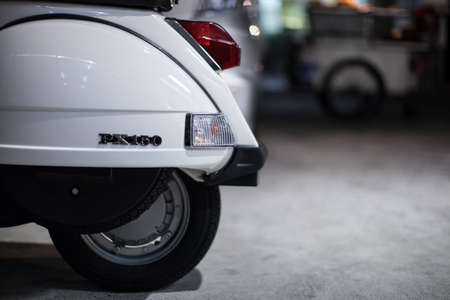 Bangkok, Thailand - February 9, 2017 : Close up detail of elegantly designed of the white vespa PX 150 scooter from Italian designerのeditorial素材
