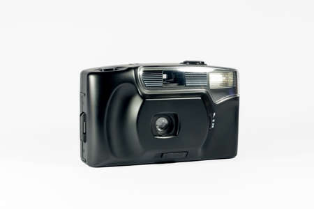 Compact 35mm film camera on white backgroundの写真素材
