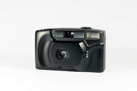Compact 35mm film camera on white backgroundの写真素材