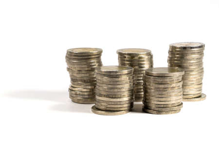 stack of coins on white backgroundの写真素材
