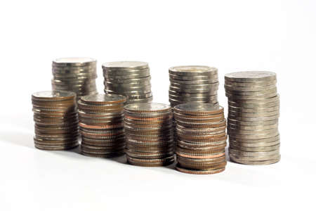 stack of coins on white backgroundの写真素材