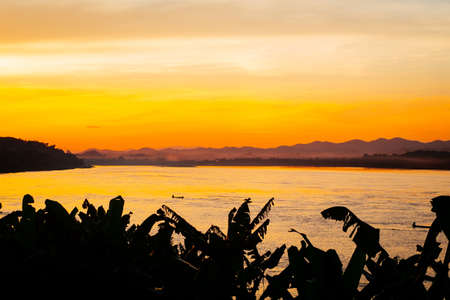 Beautiful sunset over the Khong river, Chiangkhan Thailand.の写真素材