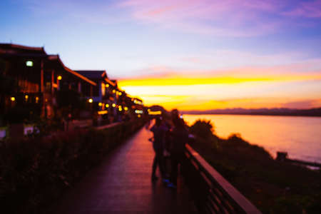 Blurred view of river side silhouette landscape in sunset moment at Chiangkhan, Thailand.の写真素材