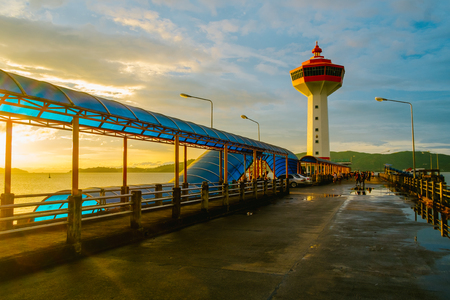 Sunset at Ranong port, Pier and Lighthouse at Ranong,Thailandの写真素材