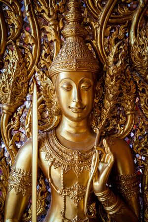 Close-up of  Golden ancient thai craft art  locates in the Golden Castle or Prasat Thong-kam at Wat Thasung, Uthai Thani, Thailand (Selective focus)のeditorial素材