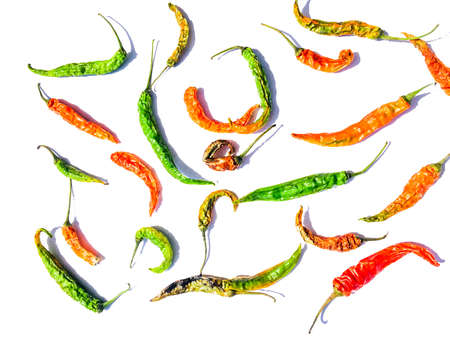 green and red chilies on white backgroundの写真素材