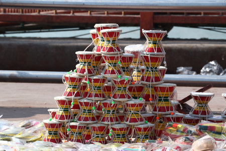 Colorful plastic containers for fishing on the river bank in Thailand.