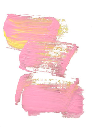 pink and yellow paint brush strokes isolated on a white background.の写真素材