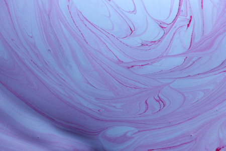 Abstract background of acrylic paint in purple and white tones. Close-up.の写真素材