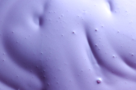 Purple cosmetic texture closeup background. Cosmetic gel, lotion, cream texture.の写真素材