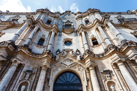 Ornate facade of the old seminary de San Carlos and San Ambrosio - now Cultural Center Felix Varela in Old Havana, Cubaの写真素材